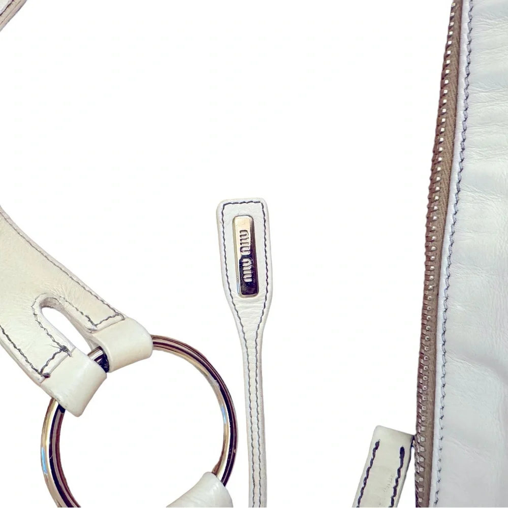Vintage Miu Miu white leather hobo bag in excellent used condition.